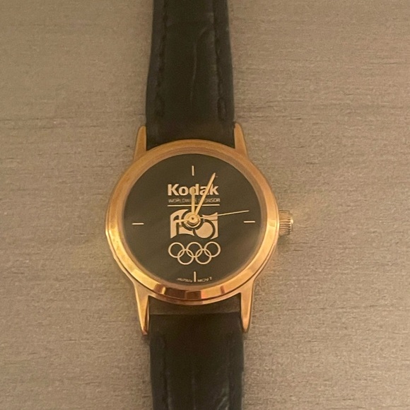 Kodak Olympics Ladies Watch Vintage Genuine Black Leather Yellow Gold Tone Case - Picture 1 of 5